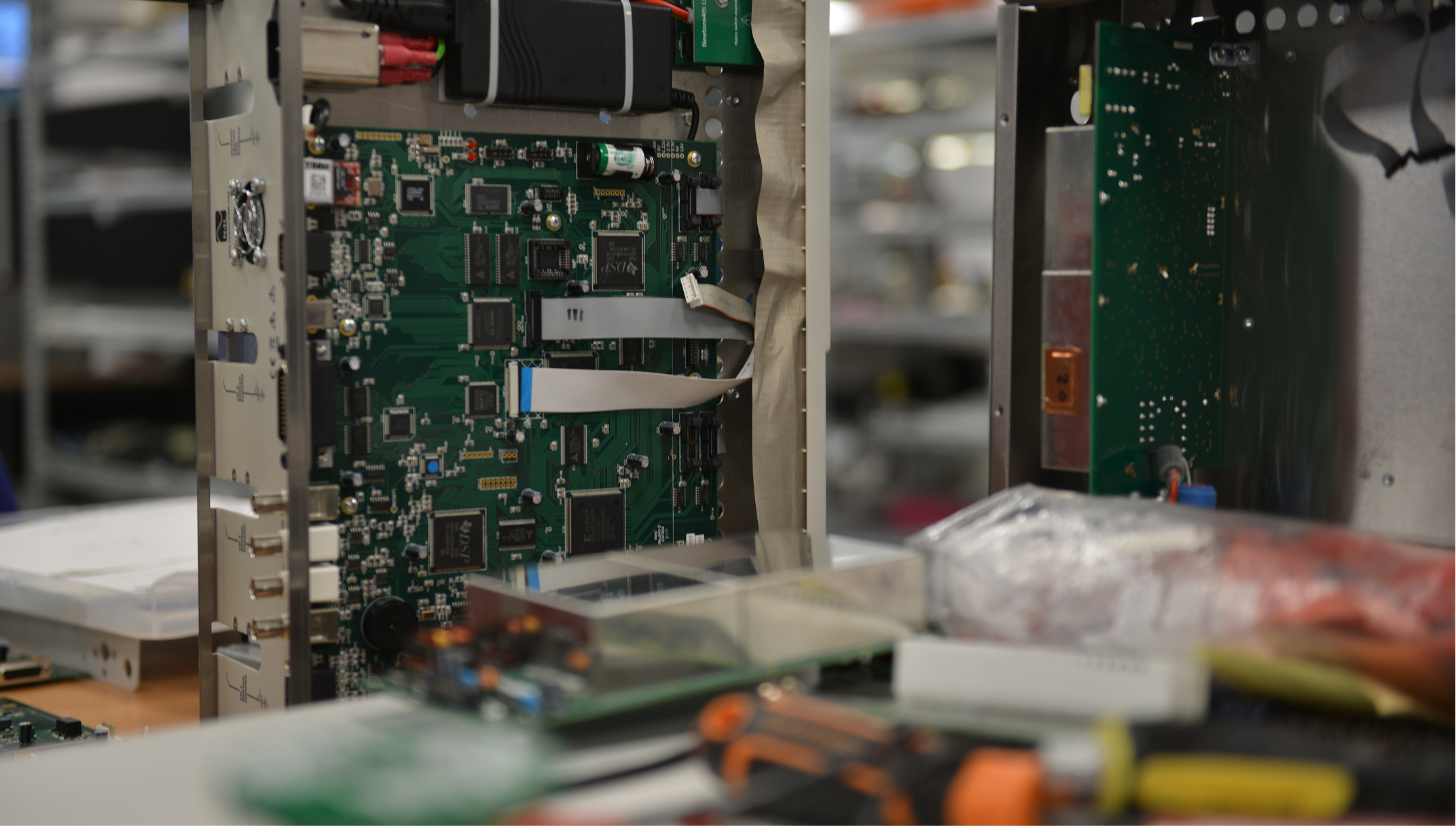 Work bench showing the partial assembly of a bespoke Newtons4th Test System.